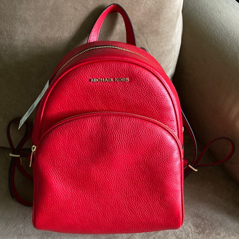 MK red leather backpack
